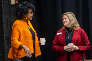 Two women talking with each other