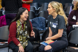 Two women talking to each other