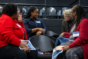 Four women having a conversation
