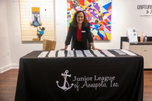 Woman at table with name cards